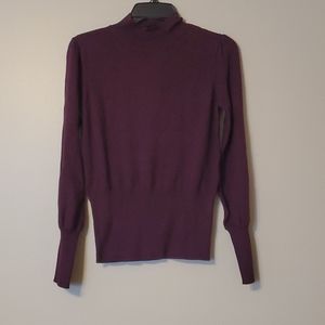 Anthro Skies are blue open back sweater, worn once.